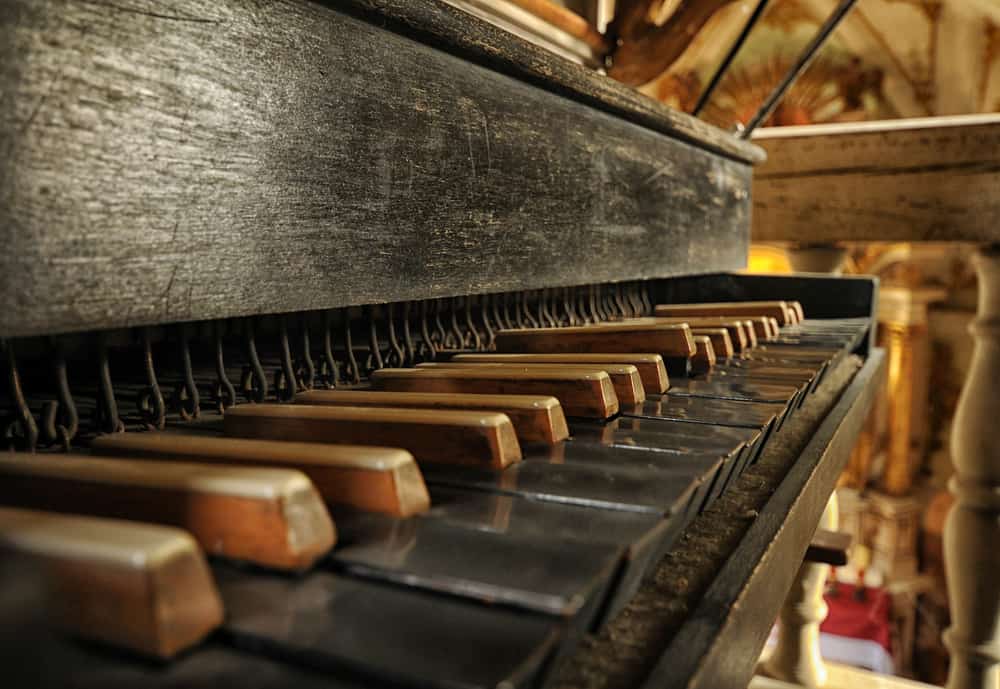 An old pipe organ, most likely from a church.